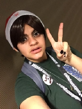Mya at Con Alt Delete 2016, cosplaying as a Christmasy Eren Yeager from Attack on Titan